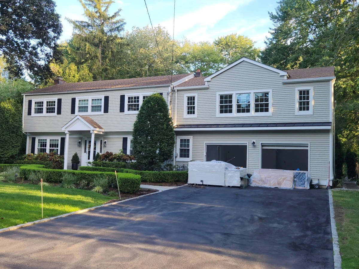 Finished family room addition in Stamford CT with large windows